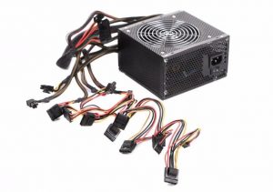An isolated image of a PC power supply unit with various cables and connectors spread out on a white background.