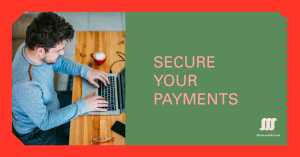 A person working on a laptop at a wooden table, with a red cup and glasses beside them. The background features a green panel with the text "SECURE YOUR PAYMENTS" and the NetworkUstad logo.