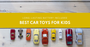 A collection of colorful toy cars arranged on a wooden surface with a yellow banner above reading “Long-lasting battery included - Best car toys for kids.”