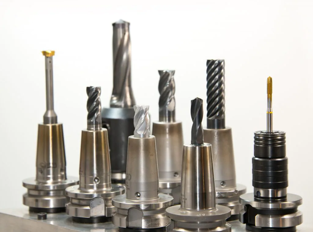 How do you determine which positional reference is the most appropriate when machining parts.