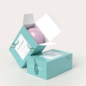 Lavender-scented natural bath bomb in teal packaging