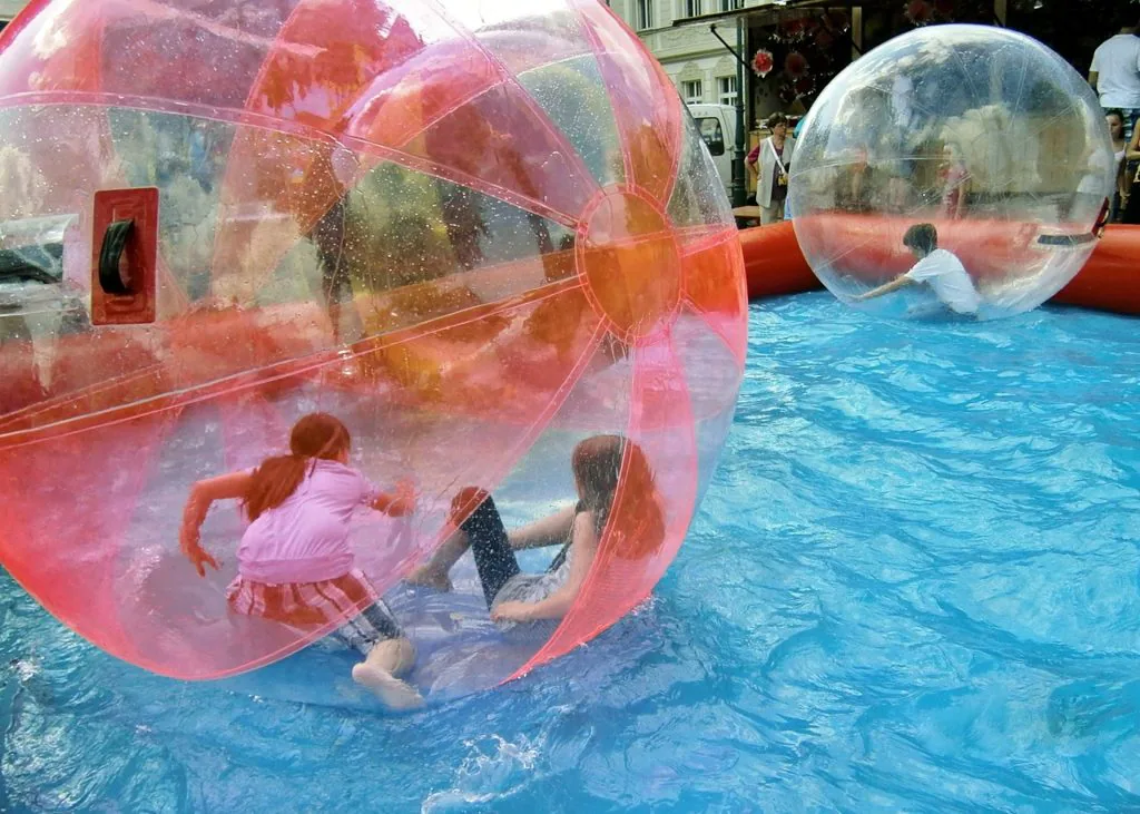 Spend quality time with your family while playing zorb ball.
