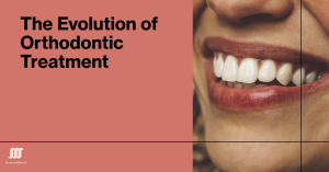 Close-up of a smiling person showing straight teeth, illustrating the results of orthodontic treatment.