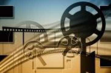 Hubflix: Stylized representation of cinema evolution from film reels to digital pixels.