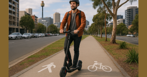 Electric scooter rider on a shared path in urban Australia complying with 2025 laws