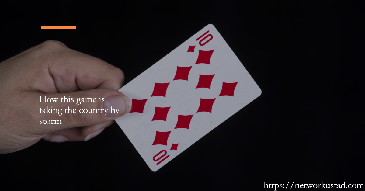 A hand holding a playing card, the ten of diamonds, against a black background with text overlay and a website URL.