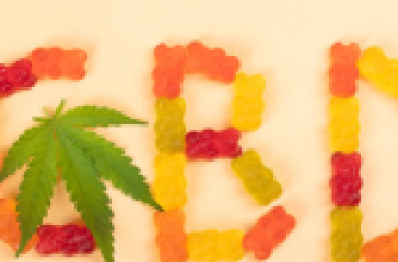 CBD hemp gummies and alcohol bottles side by side