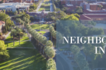Aerial view of one of Orange County’s top neighborhoods with verdant landscapes and modern buildings, highlighting desirable living areas.