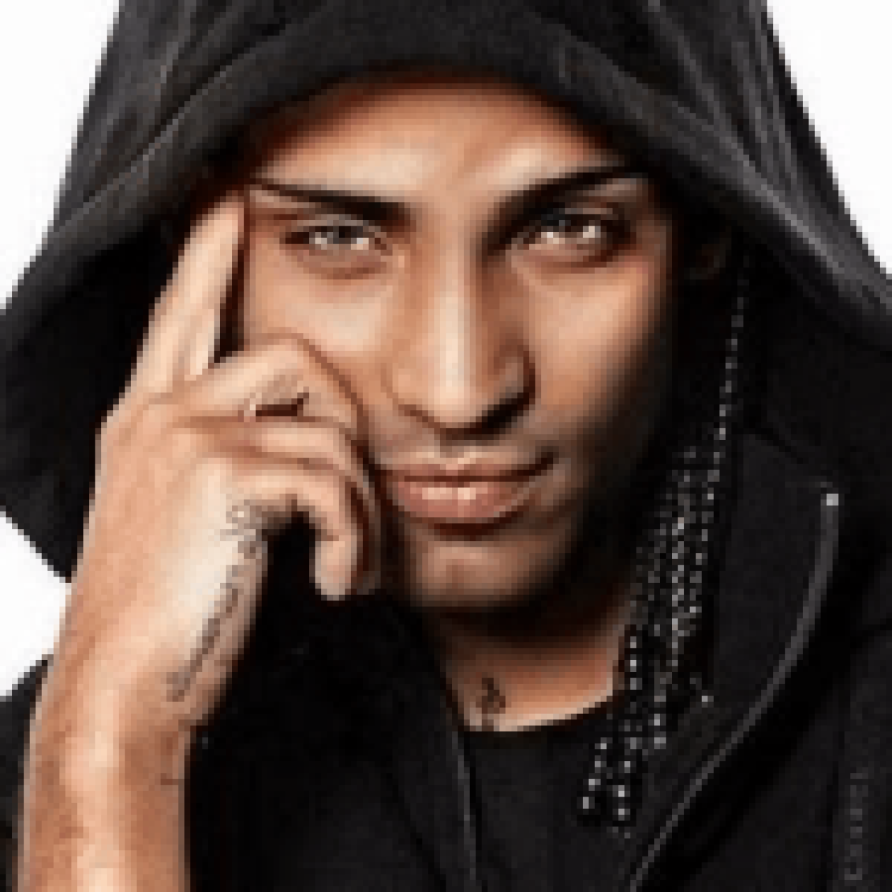 Person in a black hoodie with hand on face, representing Arcangel’s enigmatic presence. #Arcangel Height