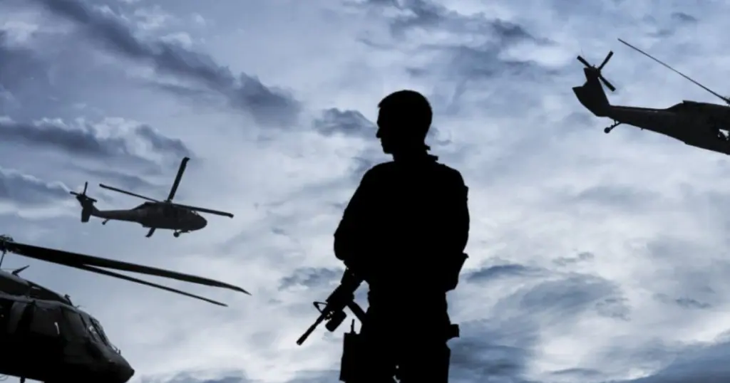 Brave soldier standing with determination, holding a gun in hands