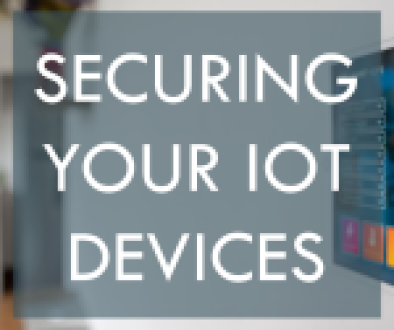 A digital interface displaying the message “SECURING YOUR IOT DEVICES” with a padlock icon, surrounded by various colorful application icons, mounted on a glass wall in a modern home setting.
