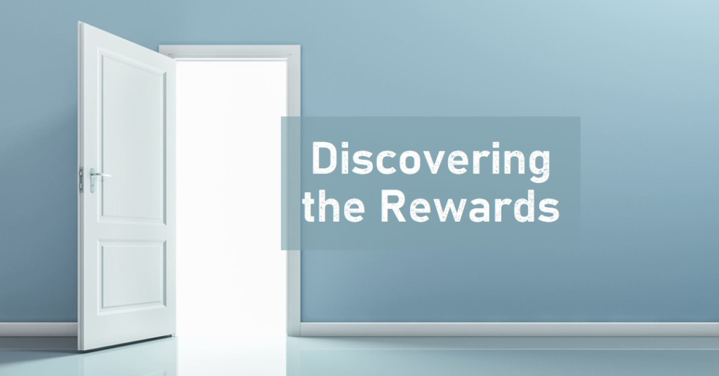 An open white door on a blue wall with light streaming through the doorway, accompanied by the text “Discovering the Rewards.