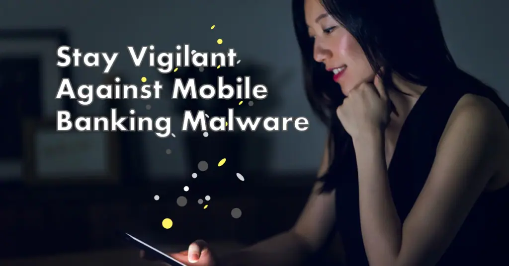 The image shows a person sitting in a dimly lit room, looking at a mobile phone with a concerned expression. The individual’s face is pixelated to maintain privacy. Above the person, there is text that reads “Stay Vigilant. Against Mobile Banking Malware.” This image emphasizes the importance of being cautious with mobile banking applications due to potential malware threats, serving as a powerful visual for cybersecurity awareness campaigns.
