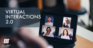 A laptop screen displaying a video call with four participants, each with a cardboard box over their head, symbolizing anonymity or lack of personal connection in digital meetings.