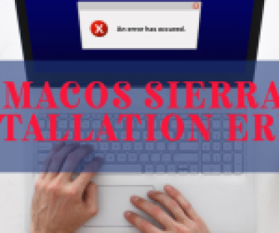 A person’s hands on a keyboard with a laptop screen displaying an error message during macOS Sierra installation.