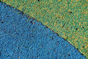 a close up of a blue and yellow surface