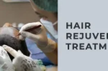 A professional performing a hair rejuvenation treatment on a client in a clinic.