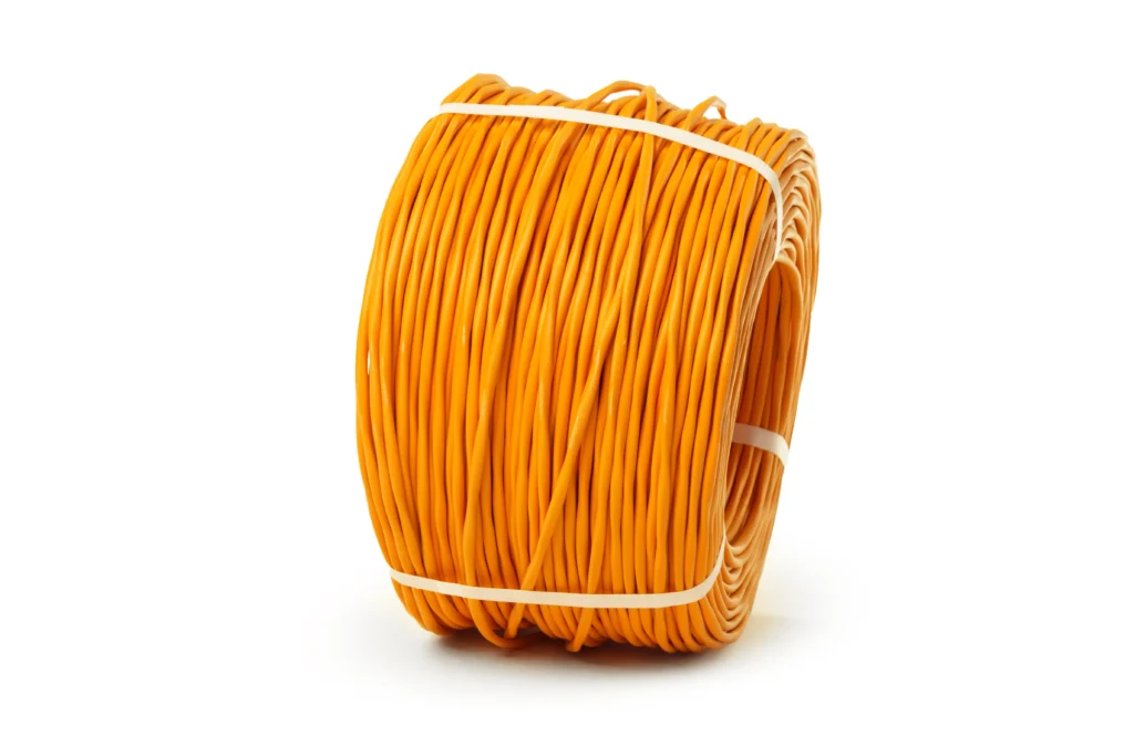 A neatly coiled orange shielded twisted pair (STP) cable, secured with white plastic bands.