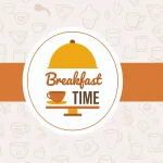 Greggs Breakfast Roll With Bacon And A Steaming Coffee On A Rustic Table, Symbolizing Quick And Affordable Morning Meals.