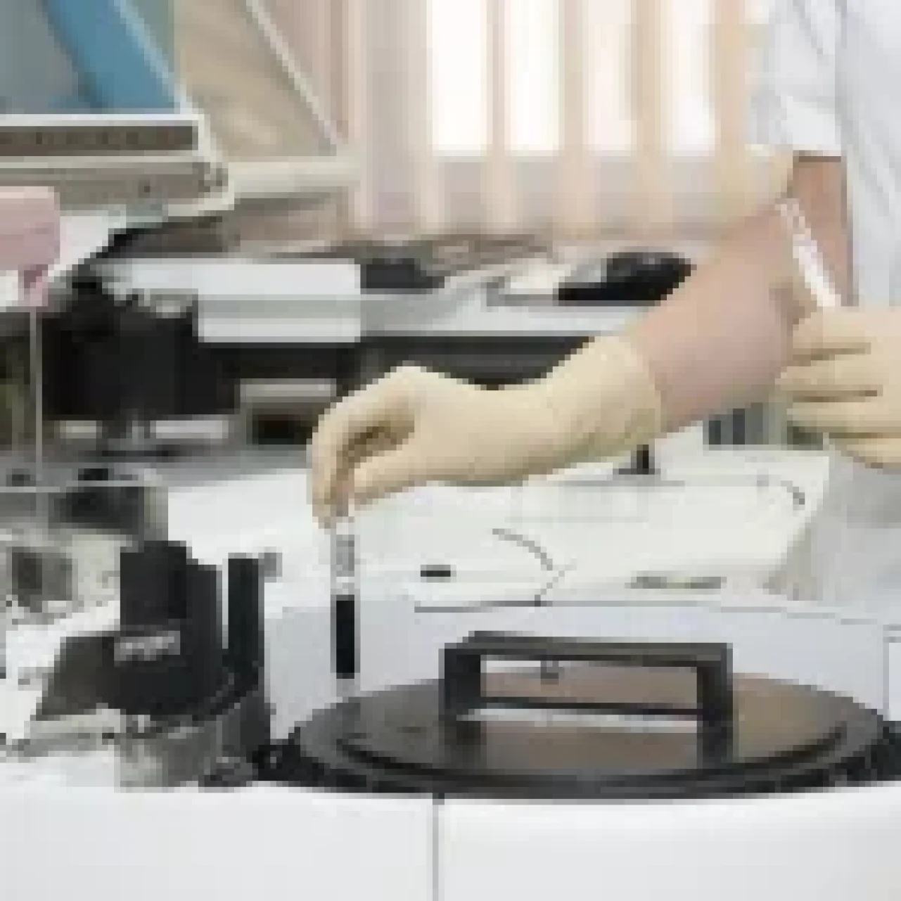 a person holding a test tube