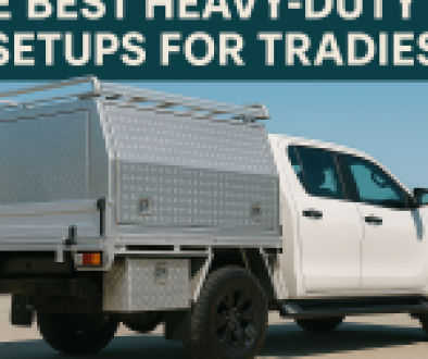 A white dual-cab ute with a silver aluminum canopy and toolboxes, parked outdoors on concrete, showcasing a heavy-duty setup for tradies.