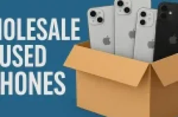 A cardboard box containing multiple used iPhones, showcasing wholesale deals.