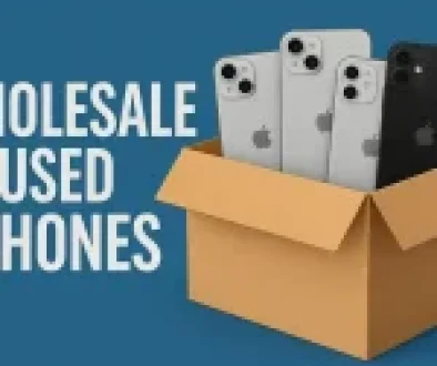 A cardboard box containing multiple used iPhones, showcasing wholesale deals.